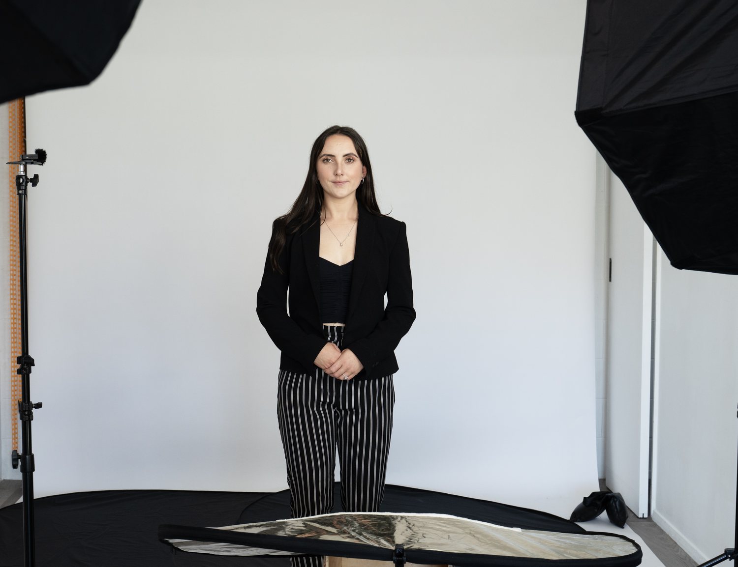 A digital twin filming session on a clean studio backdrop